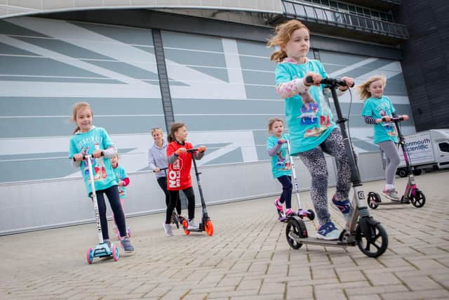 A group of six 7-year-olds from Cumberland Infant School have taken on a sponsored scoot for Sport Relief and are at their finishing point at INEOS Team UK HQ in Old Portsmouth on 13 Friday March 2020.

Pictured: 
Anabelle Day, Aidana Gawthorpe, Kacy Turner, Eeva Stafford and Iris Savage riding past INEOS Team UK HQ.
Picture: Habibur Rahman (130320-15)