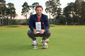 Hayling's Toby Burden after his Courage Trophy win also earned him the Cole Scuttle for the best 72 hole score in the Courage and county championship qualifier, and the Cullen Quaich after winning the Hampshire Order of Merit last September. Picture:  Andrew Griffin.