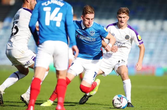Ronan Curtis huffs and he puffs, but can still find no way through for Pompey in their goalless draw with Shrewsbury. Picture: Joe Pepler