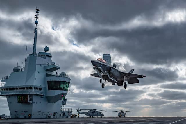 The view of HMS Queen Elizabeth's flight deck during operational testing with the UKs F-35B Lightning jets. This image was part of the Peregrine Trophy winning selection from HMS Queen Elizabeth. The image also won the Best in Show Prize. Picture by Leading Photographer Kyle Heller