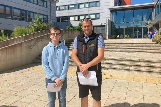 Martin Bishop (right) and Lewis Marchant celebrate their Level 3 in motorsport at Fareham College on August 10, 2021.