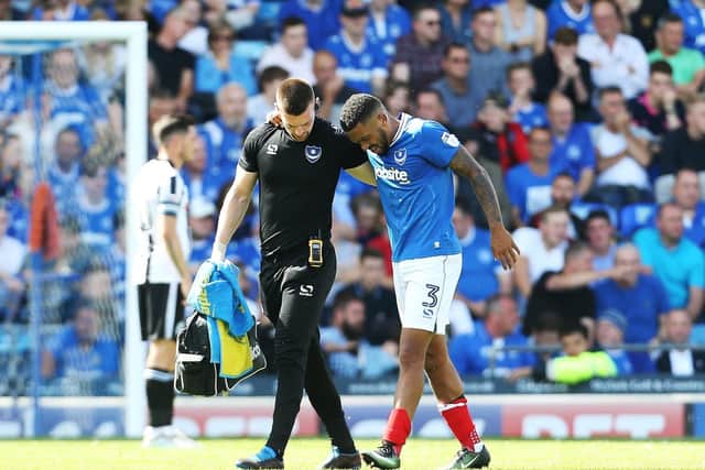 Tareiq Holmes-Dennis limped off on his Pompey debut in August 2017. He made just 30 more career appearances - and announced his retirement on Sunday. Picture: Joe Pepler
