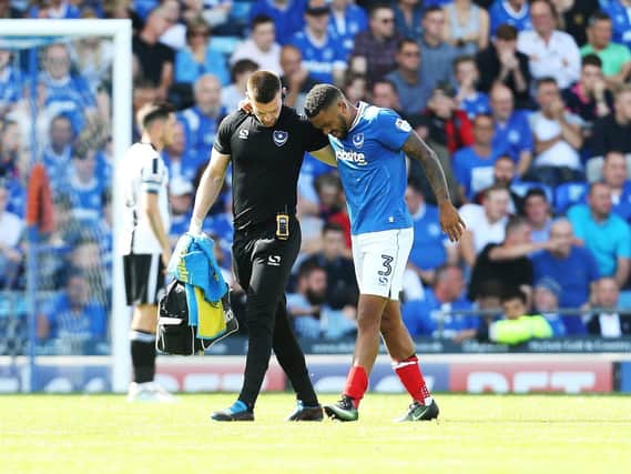 Tareiq Holmes-Dennis limped off on his Pompey debut in August 2017. He made just 30 more career appearances - and announced his retirement on Sunday. Picture: Joe Pepler