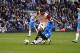 Kusini Yengi fires Pompey ahead in the 77th minute against Peterborough.