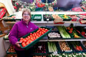 Co-owner of the business, Sue Ings, shows there is is no shortage of tomatoes at Ron White greencrocers, Marmion Road, Southsea. Picture: Chris Moorhouse (jpns 240223-25)