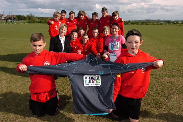 Will Colling and Layton Watts, right, with their Farringdon Detached Under 12's team mates and the special sponsored strip they were due to wear at a football tournament in Blackpool.