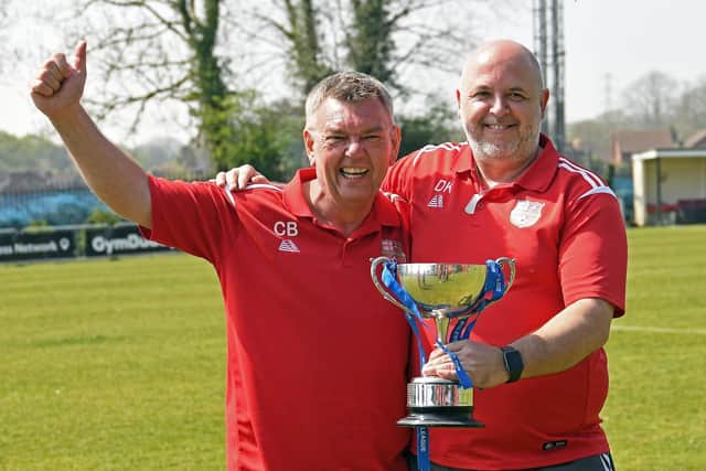 Stubbington boss Charlie Barley (left) and assistant manager Dean Knibbs with the Len Day Cup.
Picture: Neil Marshall