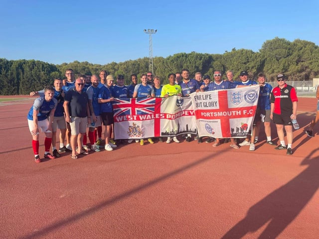 Posing with the players post-match on the side of the pitch - it could only happen on a Pompey pre-season tour!