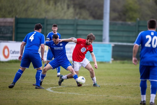Action from Gosport Town's 4-0 victory over Lee Rangers (blue kit) in the Portsmouth & District FA Trophy final at Cams Alders. Picture: Alex Shute