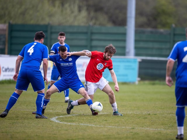 Action from Gosport Town's 4-0 victory over Lee Rangers (blue kit) in the Portsmouth & District FA Trophy final at Cams Alders. Picture: Alex Shute