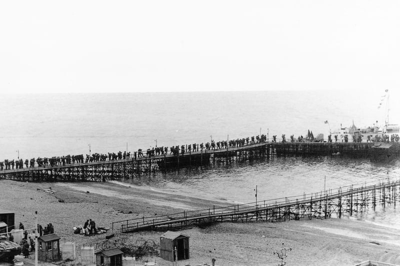 Troops, believed to be Royal Canadian Engineers, on board an LCI(L) alongside South Parade Pier, about to embark for Normandy. Probably after D-Day.