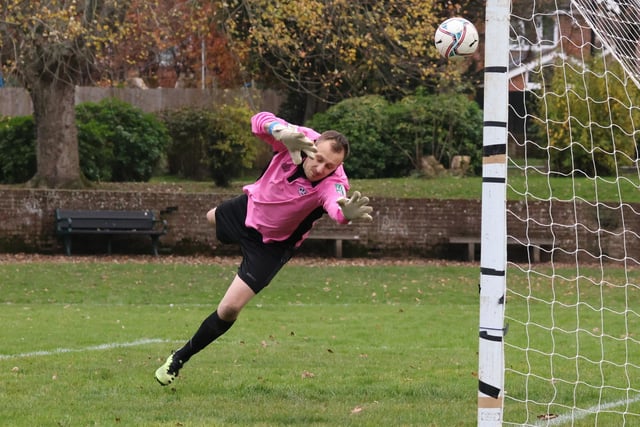 The AFC Prospect Farm Rangers keeper is beaten - but this Bedhampton Village shot struck  the woodwork. Picture by Kevin Shipp