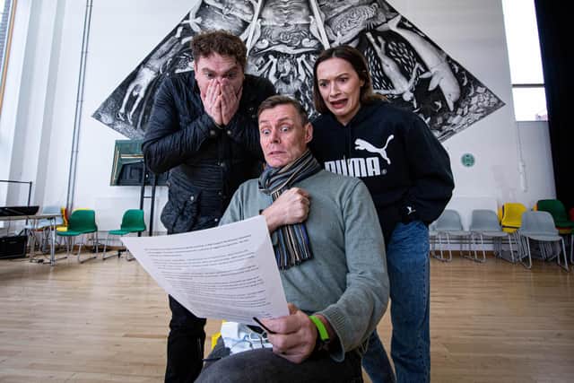 The cast of Cinderella at New Theatre Royal, Portsmouth reading out The News Portsmouth Christmas Ghost stories.
Pictured: Chris Aukett who plays Marjorie the Ugly Sister, Edward Baker-Duly who plays the Baron Hardu and Ellie Fullalove who plays Dandini at New Theatre Royal, Portsmouth.

Picture: Habibur Rahman