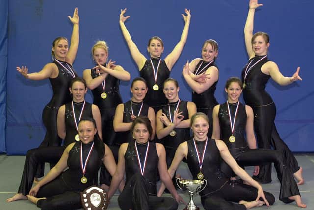 The Portsmouth School of Gymnastics Senior A national title winning team, April 2004. Back (from left): Amanda Smith, Vickie Dicken, Sasha Dennett, Lisa Cunningham, Vicki Bricknell. Middle: Leah Wilson, Leanne Smith, Sam Wilcox, Alex Rangecroft. Front: Jayde Bailey, Ana Wilson, Syd Smith. Picture: Jonathan Brady.