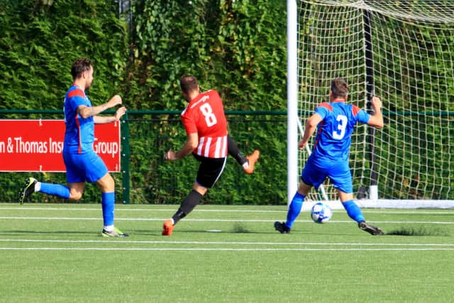 Brett Pitman scores the first of his four goals against Fareham. Picture by Ken Walker