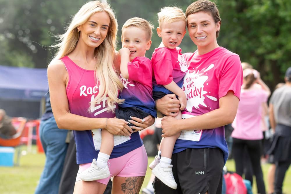 The Traitors winner Leanne Quigley with partner, Sophie Jones and their children at Race for Life