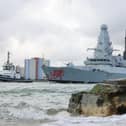 HMS Dragon is unlikely to be deployed to the Strait of Hormuz, defence experts have said. Pictured is the Type 45 destroyer leaving Portsmouth Portsmouth Harbour today on its way to the eastern Mediterranean.