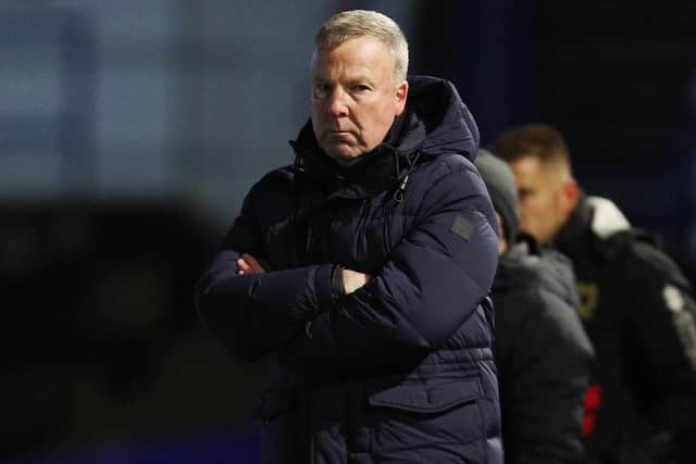 Kenny Jackett watches his Pompey side from the technical area. Picture: Joe Pepler