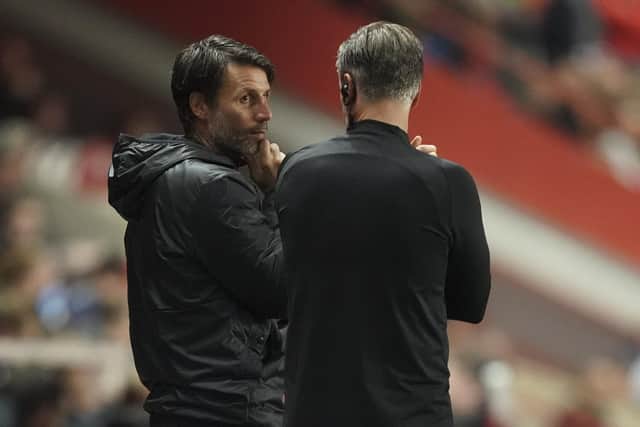 Pompey boss Danny Cowley in deep conversation with Nicky Cowley at Charlton on Monday night