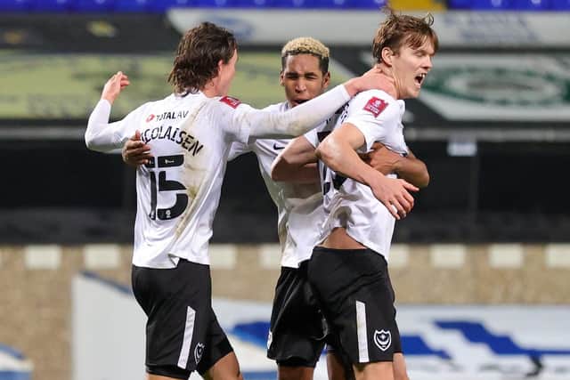 Sean Raggett celebrates scoring Pompey's FA Cup first-round winner against Ipswich in November.