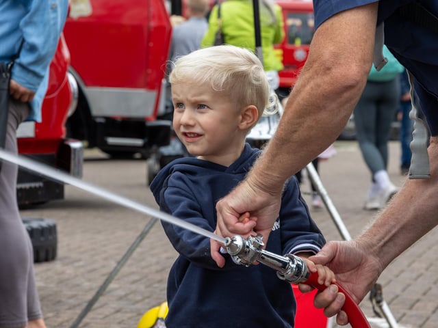 Walter Shute, 3, helps putting out fires at the Port Solent 999 Day.  Photos by Alex Shute