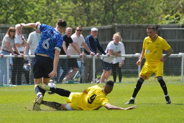 Harvest (yellow) v Hook. Picture by Ian Grainger.