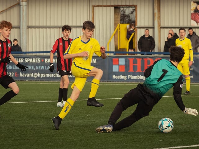 Action from the U16 GEC Marconi Invitation Cup final between Horndean Hawks Condors (red/black) and Pickwick Youth Panthers (yellow). Picture: Keith Woodland (260221-683)