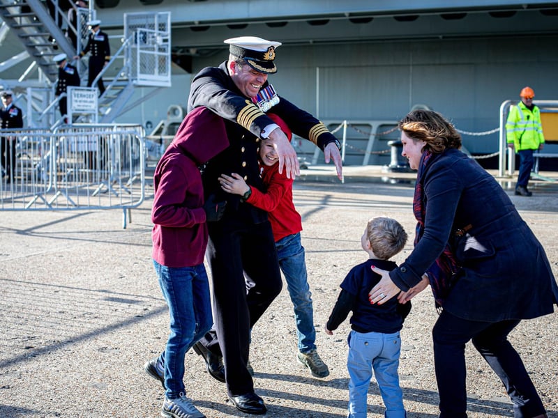 Pictured: Commanding Officer Captain Richard Hewitt OBE greets his wife Clara his children Oliver , 10 and William, 8 and Ben 2
Picture: Habibur Rahman