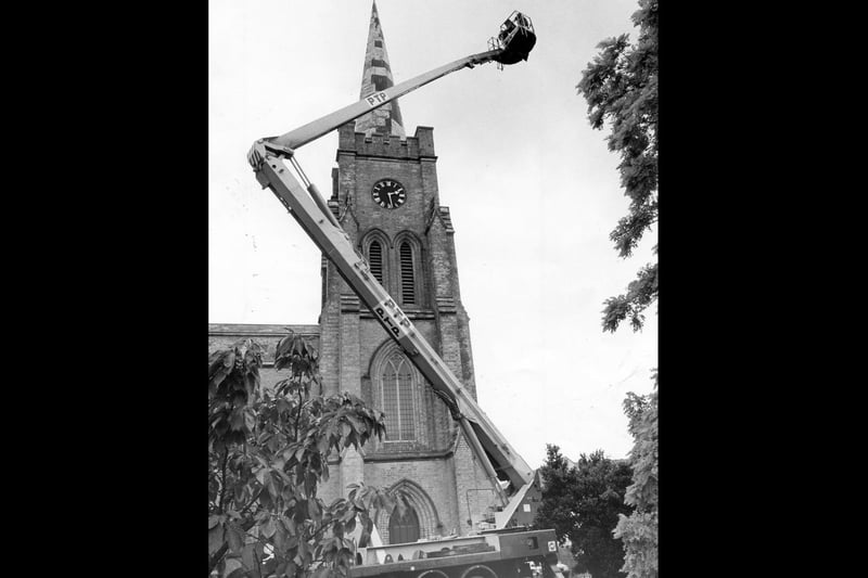 Repairs take place on the steeple at Holy Trinity Church in Fareham on August 2 1988. The News PP3173