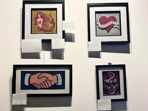 Some of the glittering artwork on display at the exhibition.