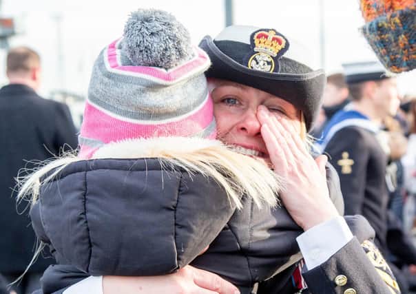 Pictured:Jenni Smith embraces with Evelyn 7 in front of HMS Defender
Picture: Habibur Rahman