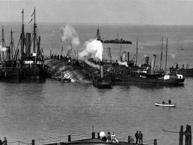 HMS Gladiator passing Victoria Pier en-route to Portsmouth Dockyard.Being assisted by tugs and associated vessels HMS Gladiator is assisted into Portsmouth Harbour. People watch on from Victoria Pier. HMS Gladiator Portsmouth-based cruiser and American steamer SS Saint Paul collided in a snowstorm off the Isle of Wight on April 25 in 1908. One officer and 28 men in total had died, most of them drowned. Strangely, the SS Saint Paul capsized and sank in New York Harbour on 25 April, 1918, exactly 10 years after HMS Gladiator sank. Picture: Paul Costen collection