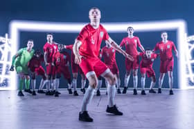 Tom Lane as Eric Dier and the cast of Dear England. Picture: Marc Brenner
