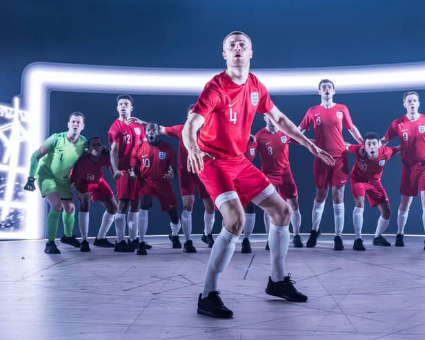 Tom Lane as Eric Dier and the cast of Dear England. Picture: Marc Brenner
