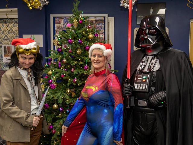 Members of 'Comic All Cosplay' welcoming visitors to the Fratton Christmas Fair. Picture: Mike Cooter (091223)