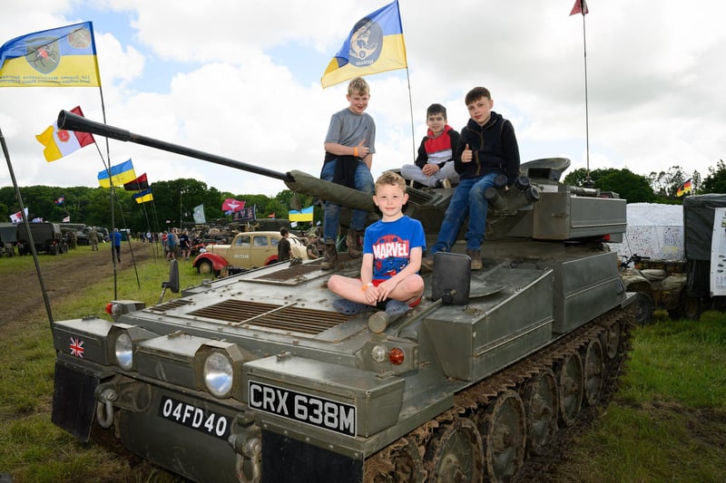 Children take the opportunity to play on a Sabre tankPicture: Keith Woodland (260521-118)