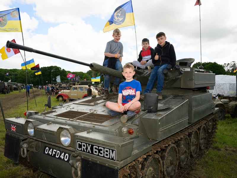 Children take the opportunity to play on a Sabre tankPicture: Keith Woodland (260521-118)