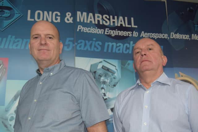 Brothers Mark Long, right, and Vince Long, left, say their family firm has been hit financially after orders dried up. Photo: Tom Cotterill