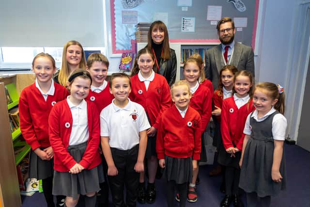 Teacher Charley Poolton with Emma Barton and headteacher Ashley Howard together with children from the Pupil's Parliament at Highbury Primary. Picture: Mike Cooter (051121)