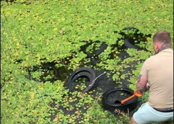 Dan Harbut, 32, retrieved 20 tyres from Fort Brockhurst moat.