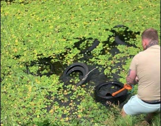 Dan Harbut, 32, retrieved 20 tyres from Fort Brockhurst moat.