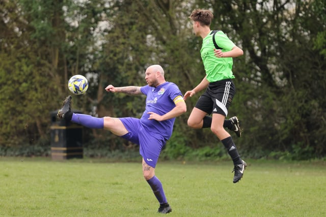 Action from the City of Portsmouth Sunday League Division Four match between AFC Bedhampton Village reserves (green and black kit) and Friends Fighting Cancer. Picture: Kevin Shipp