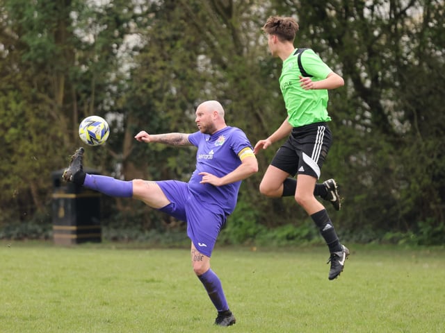 Action from the City of Portsmouth Sunday League Division Four match between AFC Bedhampton Village reserves (green and black kit) and Friends Fighting Cancer. Picture: Kevin Shipp