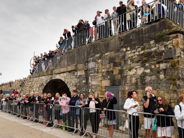 Pictured is: People gather to view the parade. Picture: Keith Woodland (190621-77).