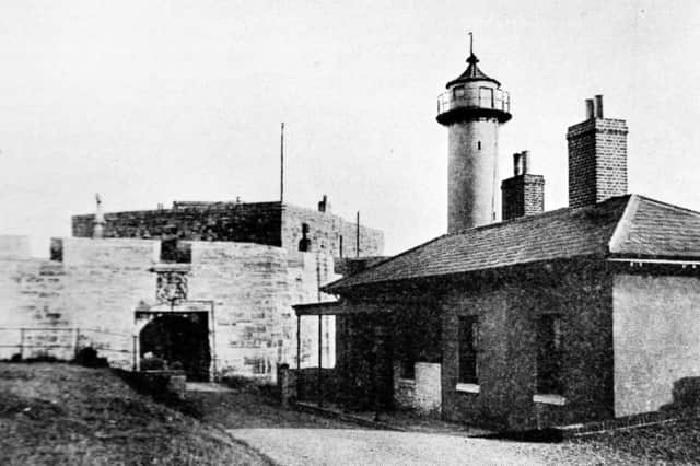 The entrance to Southsea Castle about a century ago with the long-gone light keeper's cottage.