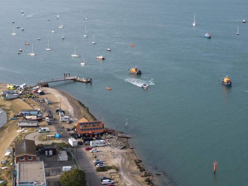 Around 140 migrants arrive in Portsmouth, Hampshire after being transferred from a single dingy south of the Isle of Wight in the English Channel by two RNLI lifeboats, a mammoth operation is talking place on Sunday evening to process the illegal migrants, with dozens of government workers from Police, Border Force, Ambulance and Fire crews, along with a number of transport busses. Dated 06/09/26.