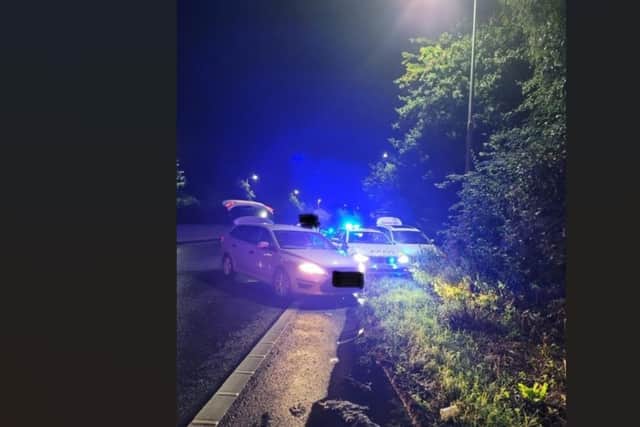 Officers have arrested three people over a suspected stolen vehicle.