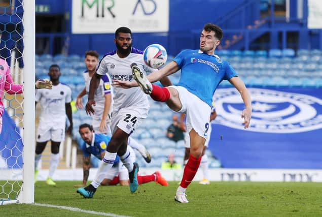 Pompey's John Marquis tries to find a way through against Shrewsbury in Saturday's goalless draw. Picture: Joe Pepler