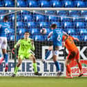 Frankie Kent makes it 3-0 to hosts Peterborough on the stroke of half-time as Pompey are eliminated from the Papa John's Trophy. Picture: Nigel Keene/ProSportsImages