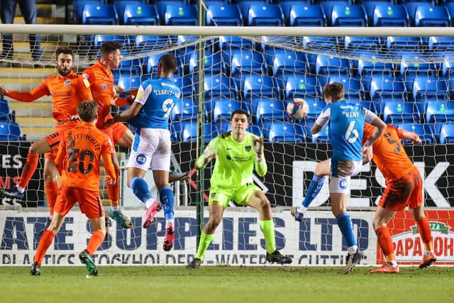 Frankie Kent makes it 3-0 to hosts Peterborough on the stroke of half-time as Pompey are eliminated from the Papa John's Trophy. Picture: Nigel Keene/ProSportsImages